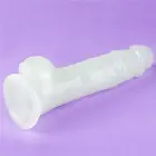 Lumino Play tumsā spīdošs dildo – 21.5 cm (8.5″) – Caurspīdīgs — Foto 17