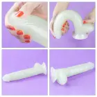 Lumino Play tumsā spīdošs dildo – 25 cm (10″) – Zils — Foto 18