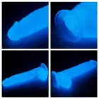 Lumino Play tumsā spīdošs dildo – 25 cm (10″) – Zils — Foto 11